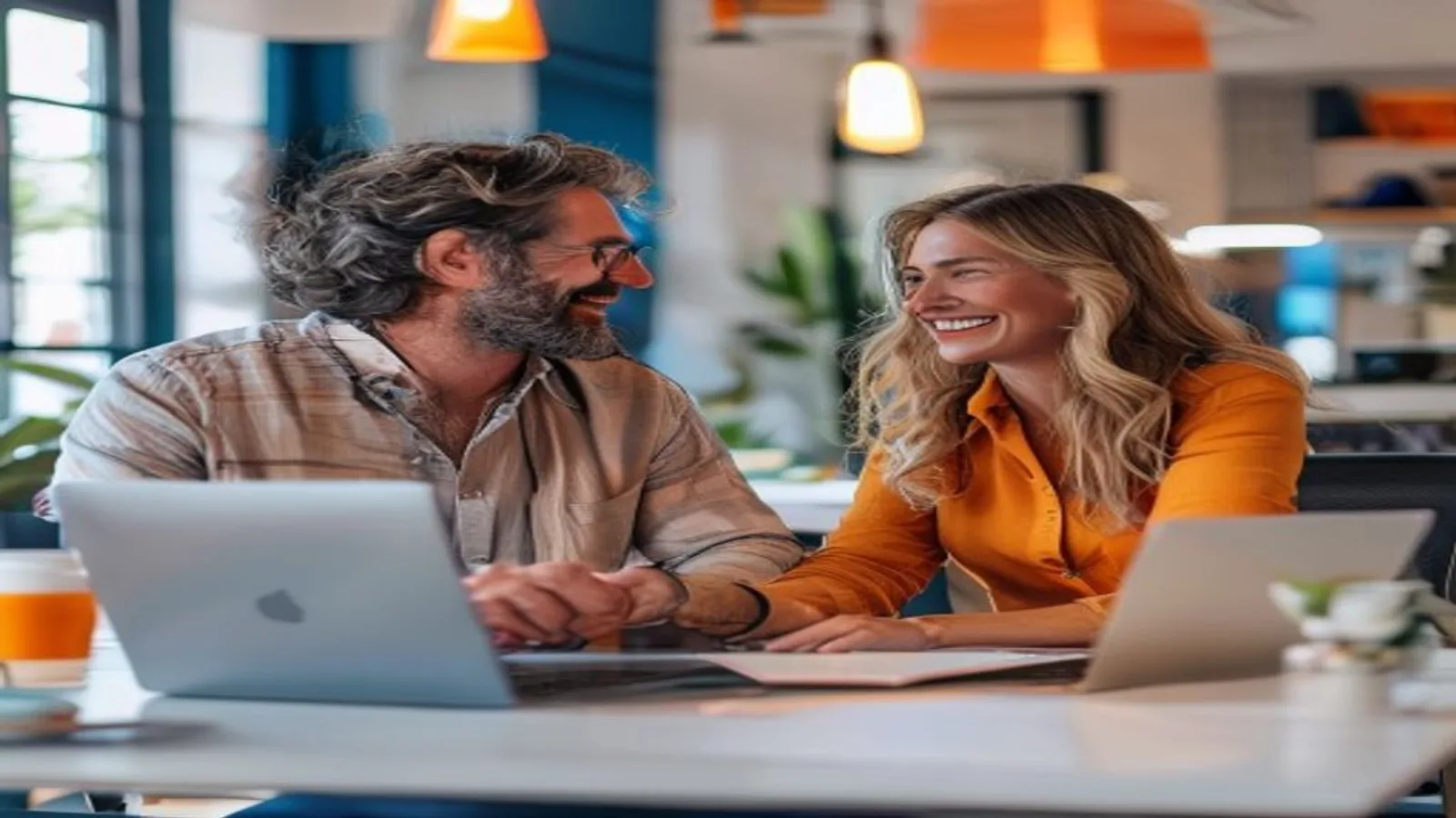 Miami small business owner and marketing professional meeting over a no-contract, month-to-month marketing agreement